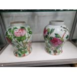 A PAIR OF CHINESE BALUSTER VASES PAINTED BIRDS AMONGST PINK PEONIES