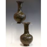 A PAIR IF EARLY 20th C. JAPANESE BRONZE BOTTLE SHAPED VASES CAST WITH STEMS OF CHRYSANTHEMUMS
