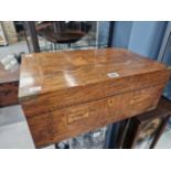 A 19th C. ROSEWOOD WRITING SLOPE. THE LID INLAID WITH THE ROYAL COAT OF ARMS, THE FRONT WITH TWO