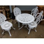 A WHITE PAINTED CAST ALLOY PATIO TABLE WITH TWO PAIRS OF SIMILAR CHAIRS