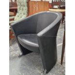 A MODERNIST LUXY ARROW ARMCHAIR WITH FORWARD CASTORS FOR DINING