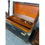AN ANTIQUE PINE CARPENTERS PINE CHEST CONTAINING VARIOUS TOOLS.