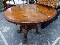 A VICTORIAN WALNUT AND INLAID TILT TOP TABLE.