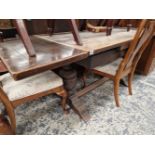 A GOOD QUALITY OAK LARGE DRAW LEAF TABLE.