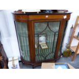 AN EDWARDIAN INLAID BOW SIDE DISPLAY CABINET.