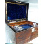 A VICTORIAN ROSEWOOD DRESSING CASE.