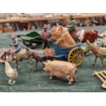 A COLLECTION OF VARIOUS BRITAINS AND OTHER DIE CAST FIGURES AND FARM RELATED MACHINERY.