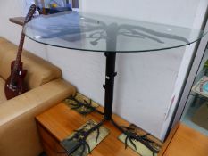 A WROUGHT IRON BASED GLASS TOP HALL TABLE.