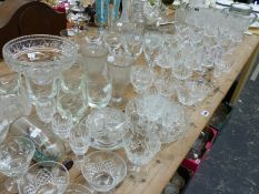 A LARGE SELECTION OF VINTAGE CUT GLASS DRINKING GLASSWARES, BOWLS, DECANTERS ETC. TOGETHER WITH A