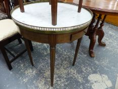 A FRENCH MARBLE TOP CIRCULAR TABLE WITH BRASS GALLERY.