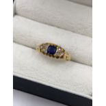 AN ANTIQUE SAPPHIRE AND OLD CUT DIAMOND BOAT STYLE RING. DATED 1903, CHESTER. FINGER SIZE O.