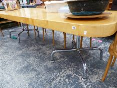 MID CENTURY RETRO. A SATIN BIRCH EXTENDING TABLE ON CHROME SUPPORTS.