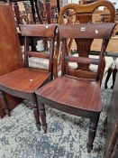 A SET OF FOUR VICTORIAN MAHOGANY DINING CHAIRS.