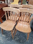 A SET OF FOUR KITCHEN CHAIRS.