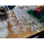 A GOOD SELECTION OF SETS OF ANTIQUE AND LATER DRINKING AND OTHER GLASS WARES, DECNTERS ETC. (QTY)