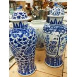 TWO ANTIQUE CHINESE BLUE AND WHITE LIDDED TALL JARS TOGETHER WITH A GINGER JAR