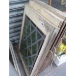 TWO PAIRS OF LEAD GLAZED SASH WINDOWS.