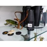 A PAIR OF USSR BINOCULARS IN CASE AND A CLOCK WORK WIND UP HOPPING VINTAGE FROG.