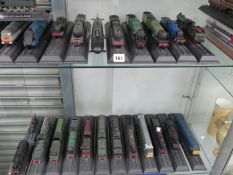 A LARGE COLLECTION OF VARIOUS MODEL TRAINS.