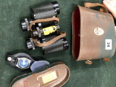 A PAIR OF SAFARI FIELD BINOCULARS, AND A CRONEL SWISS MADE WTACH ON A MILITARY STRAP.
