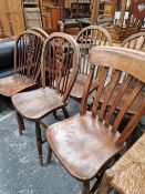 A 19th C. WHEEL BACK CHAIR, THREE SPINDLE BACK CHAIRS AND A SLAT BACK CHAIR.