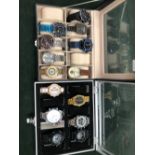 A COLLECTION OF VARIOUS WATCHES MOSTLY NEW AND UNWORN CONTAINED IN TWO TRAVEL WATCH CASES.