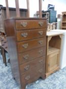 A SMALL MAHOGANY TALL CHEST OF SIX DRAWERS AND TWO BEDSIDE CABINETS.