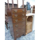 A SMALL MAHOGANY TALL CHEST OF SIX DRAWERS AND TWO BEDSIDE CABINETS.