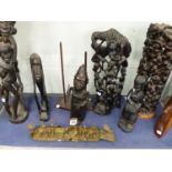 A VINTAGE AFRICAN BRONZE FIGURE, TOGETHER WITH VARIOUS CARVED HARDWOOD FIGURES.