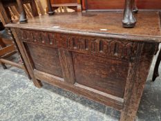AN EARLY 18th C. OAK PANEL FRONT COFFER.