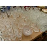 A QTY OF CUT CRYSTAL AND OTHER DRINKING GLASSWARES, DECANTERS, BOWLS ETC.
