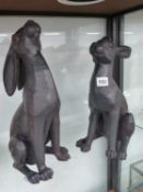 TWO SEATED HARE ORNAMENTS.