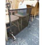 A HAND MADE WROUGHT IRON FIRE SCREEN.