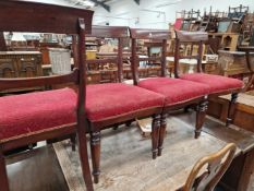 A SET OF FOUR EARLY VICTORIAN MAHOGANY DINING CHAIRS.