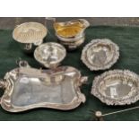 A HALLMARKED SILVER LARGE SUGER BOWL, A SMALLER EXAMPLE, TWO PIERCED EDGE SMALL DISHES WEIGHT AND