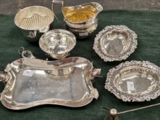 A HALLMARKED SILVER LARGE SUGER BOWL, A SMALLER EXAMPLE, TWO PIERCED EDGE SMALL DISHES WEIGHT AND