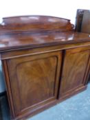 A VICTORIAN MAHOGANY DEEP SIDE CABINET WITH RAISED BACK.