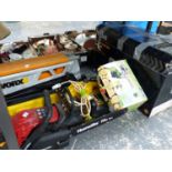 A TITN SCROLL SAW, A MCCULLOCH ELECTRIC CHAINSAW, ANOTHER CHINSAW, A WORX CUTTING CLAMP AND A