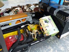 A TITN SCROLL SAW, A MCCULLOCH ELECTRIC CHAINSAW, ANOTHER CHINSAW, A WORX CUTTING CLAMP AND A