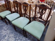 A SET OF FOUR LATE VICTORIAN DINING CHAIRS.