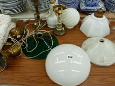 VARIOUS HANGING GLASS LIGHT SHADES AND THREE TABLE LAMPS.