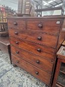 A VICTORIAN MAHOGANY TALL CHEST OF TWO SHORT AND FOUR LONG GRADUATED DRAWERS.