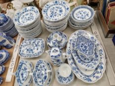 AN ANTIQUE, MEISSEN ONION PATTERN PART DINNER SERVICE BY VARIOUS MAKERS.