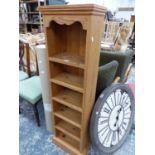 A SMALL PINE BOOKCASE.