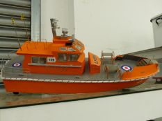 A VINTAGE SCRATCH BUILT PILOT BOAT WITH RAF MARKINGS.