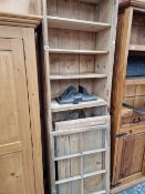 A RUSTIC PINE CABINET.