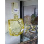 AN ART DECO YELLOW GLAS SPIRIT DECNTER AND SIX GLASSES.