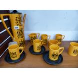 ATTRIB.TO PORTMERRION. A MID CENTURY DESIGN COFFEE SET DECORATED WITH ARMORIALS.