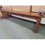 A LONG RECLAIMED PINE REFECTORY TYPE TABLE.
