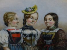 LATE 19TH CENTURY/ EARLY 20TH CENTURY GERMAN SCHOOL.- THREE GIRLS IN TRADITIONAL DRESS- WATERCOLOUR.